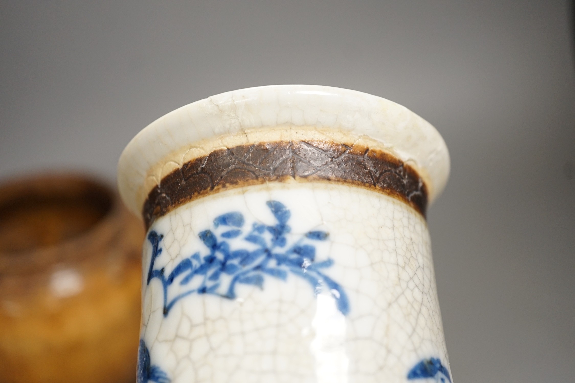 A Chinese crackle glaze blue and white sleeve vase, 20cm high, similar dish and pottery vessel